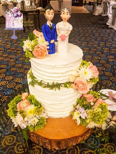 Wedding cake structure with handmade groom and the bride - Cake by Cakes by Shani