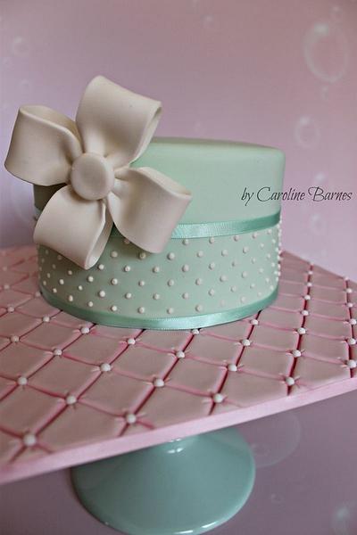 Polka dot cake with fondant bow and quilted cake board - Cake by Love Cake Create