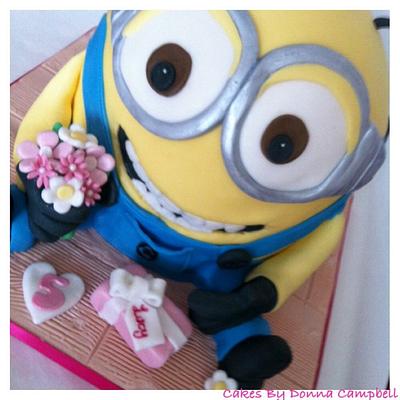 Minion cake with flowers and a present - Cake by Donna Campbell