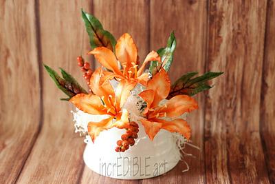 Butterfly flowers and Crotons for a cake! - Cake by Rumana Jaseel