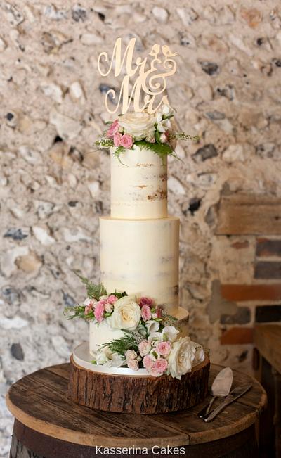 Semi naked tiered cake with fresh flowers and large topper - Cake by Kasserina Cakes