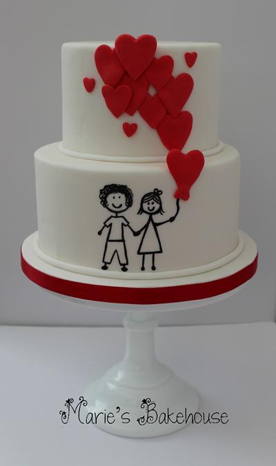 Cartoon couple with heart balloons wedding cake - Cake by Marie's Bakehouse