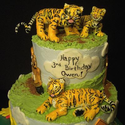 Tigers, Mater, Curious George...everything Owen loves cake! - Cake by Janan