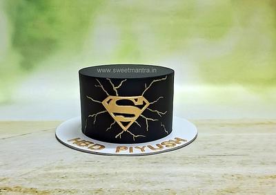 Superman black and gold cake - Cake by Sweet Mantra Homemade Customized Cakes Pune