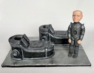 Red Dwarf Escort boots with Kryten - Cake by Gina Molyneux