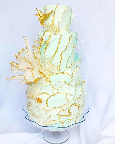 Torn paper effect ruffle cake - Cake by Lilli Oliver Cake Boutique