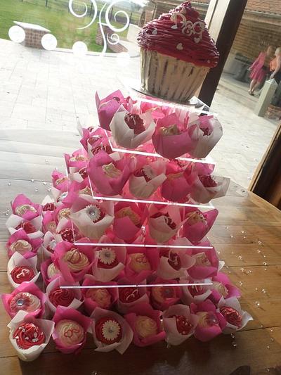 Cupcake tower for fushia colour theme wedding - Cake by The Faith, Hope and Charity Bakery