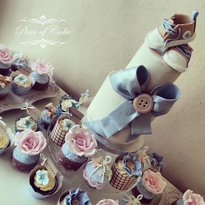 A cute little 2 tier and matching cupcakes! - Cake by PieceofCake_dh