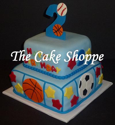 Sports themed cake - Cake by THE CAKE SHOPPE