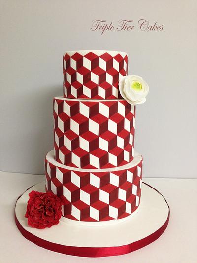 Modern red and white cake with geometric patterns. - Cake by Triple Tier Cakes