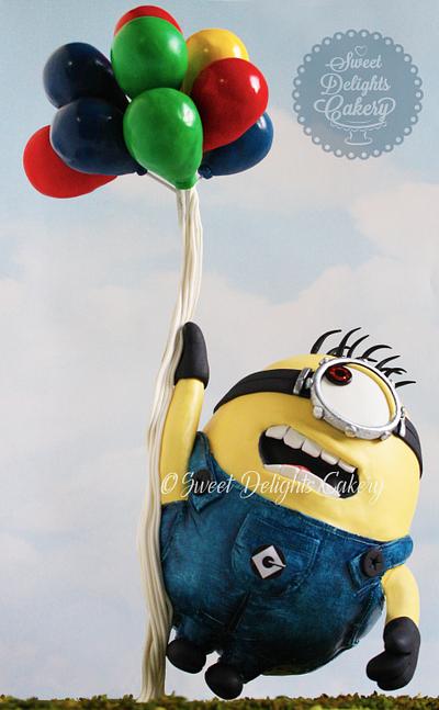 Gravity Defying Minion Cake - Cake by Sweet Delights Cakery