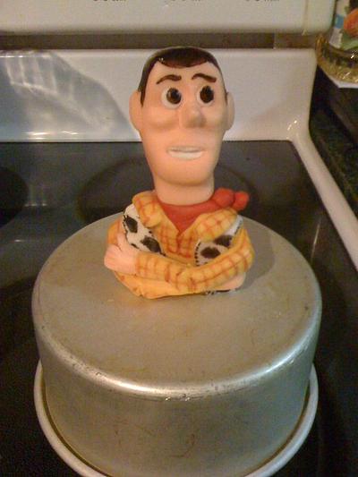 Toy Story birthday featuring "Woody" ripping through top tier - Cake by CakesbyDeb