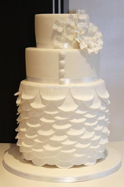 White wedding cake based on Justin Alexander dress - Cake by Boutique Cakery