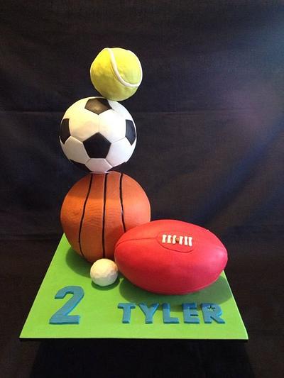 Stack of sports balls - Cake by Creative Cake Studio