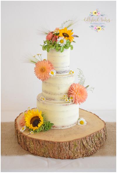 Buttercream & beautiful blooms - Cake by Dollybird Bakes