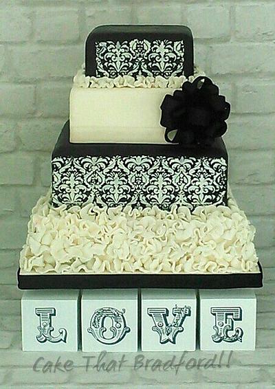 Black and cream ruffle and stencil cake - Cake by cake that Bradford