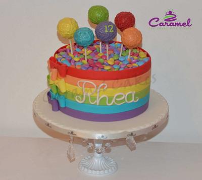 Rainbow Cake with Pops! - Cake by Caramel Doha