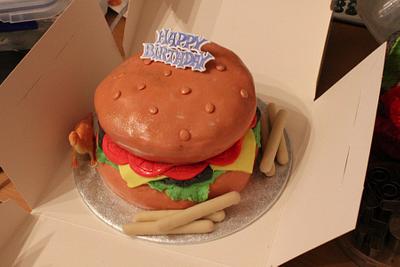Cheeseburger "happy meal" With burger, fries and a toy.  - Cake by marge1