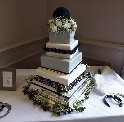 off set square, lace, cushion & ruffles wedding cake.. with flower ball! :) - Cake by Storyteller Cakes