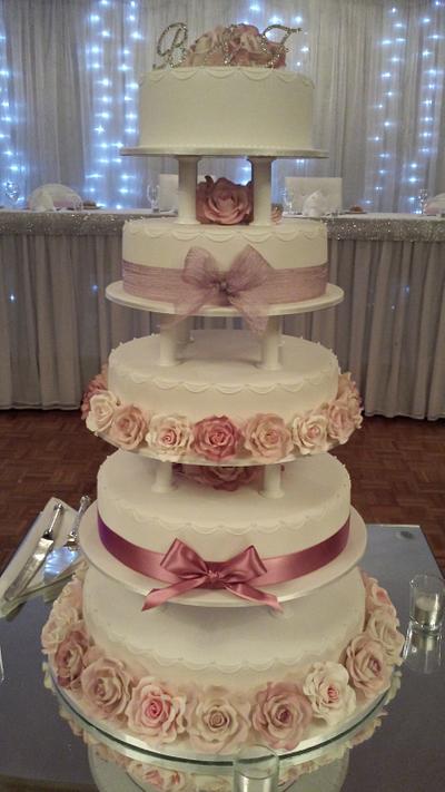 5Tier wedding cake on pillars. - Cake by Paul Delaney of Delaneys cakes