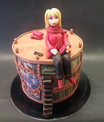 Woman on bookshelves - Cake by Rita