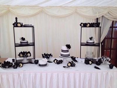 Black and white feather dessert table  - Cake by Missyclairescakes