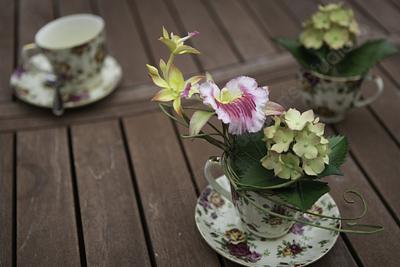 Gumpaste Orchids and Hydrangea Arrangement - Cake by SAIMA HEBEL