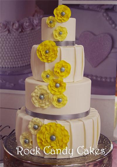 Pleasts with Yellow Rosettes - Cake by Rock Candy Cakes