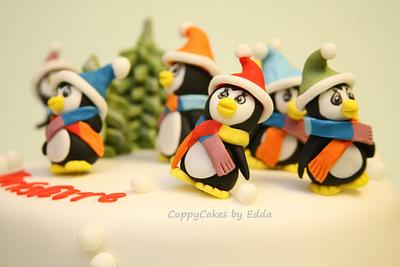 7 dancing rainbow penguins - Cake by edda