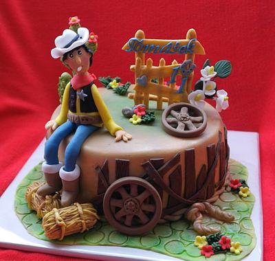 with a cowboy - Cake by Táji Cakes