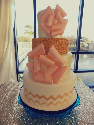 Weekend wedding fayre, peaches and bows. - Cake by Divine Bakes