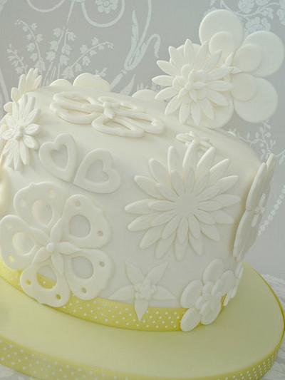 White cut out flower cake - Cake by Isabelle Bambridge