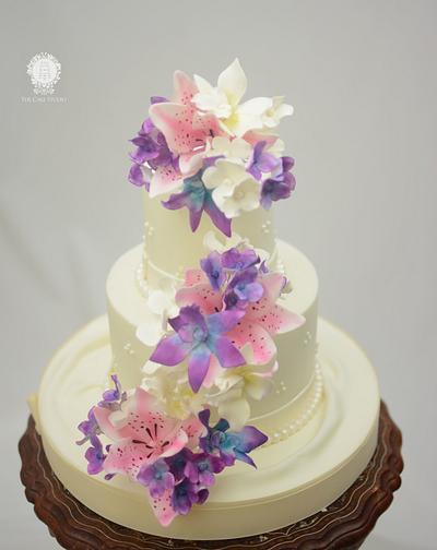 Wedding Cake with Orchids and Stargazer Lilies - Cake by Sugarpixy