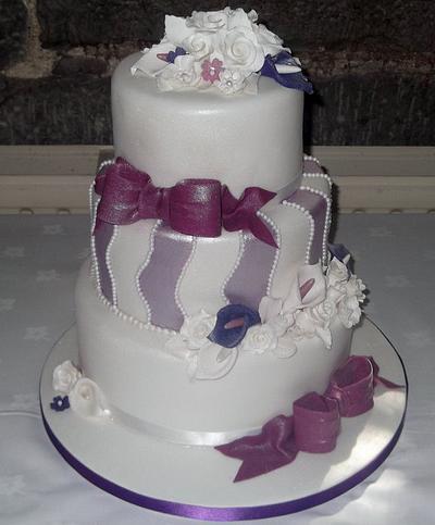 Pretty purple wedding cake - Cake by dazzleliciouscakes