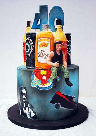 80's inspired booze and action heros. - Cake by Danielle Lainton