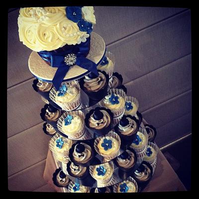 Wedding cupcake tower with bride & groom cupcakes! - Cake by cjsweettreats