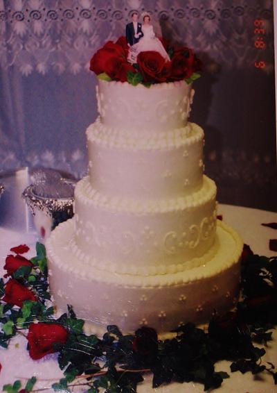 Round red rose buttercream wedding cake - Cake by Nancys Fancys Cakes & Catering (Nancy Goolsby)