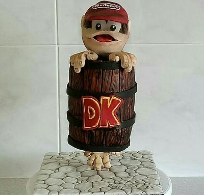 Gravity defying Diddy Kong stuck in a DK barrel cake. - Cake by Jewels Cakes