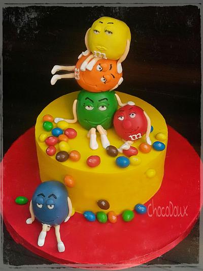 rolling m&m cake - Cake by chocodouxindia