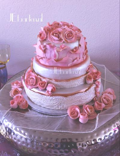 Pink wedding cake with roses and lace - Cake by Judith-JEtaarten
