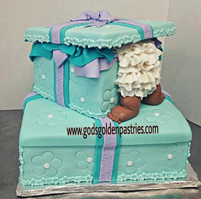 Baby in gift box baby shower cake - Cake by God's Golden Pastries
