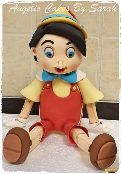 Pinnocchio and Jimminy Cricket Cake Toppers - Cake by Angelic Cakes By Sarah