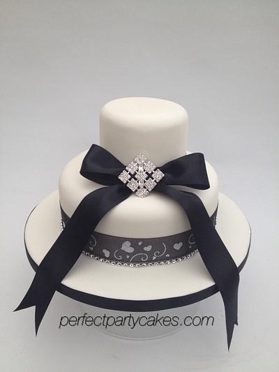 Simple two tier brooch wedding cake - Cake by Perfect Party Cakes (Sharon Ward)