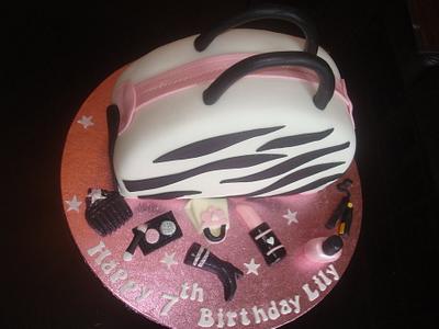 Zebra print glamour make up bag with edible accessories - Cake by Inafoodieworld