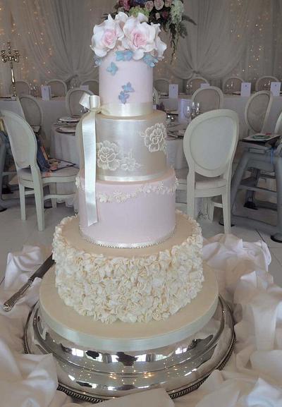 Wedding cake with flowers, bows and ruffles  - Cake by Jenny's Cakes