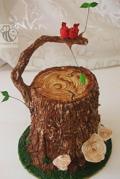 Love birds on a treestump cake =) - Cake by Bumblebee Bakes Goa