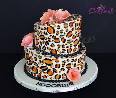 Topsy Turvy Leopard SkinCake - Cake by Caramel Doha