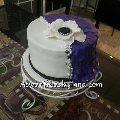 Purple and white cake.  - Cake by Innessa M
