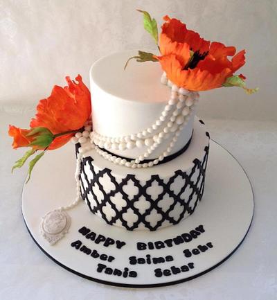 classy white and black with california poppy flower. - Cake by Cakes for mates