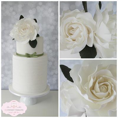 Double barrel wedding cake with oversized roses - Cake by cjsweettreats